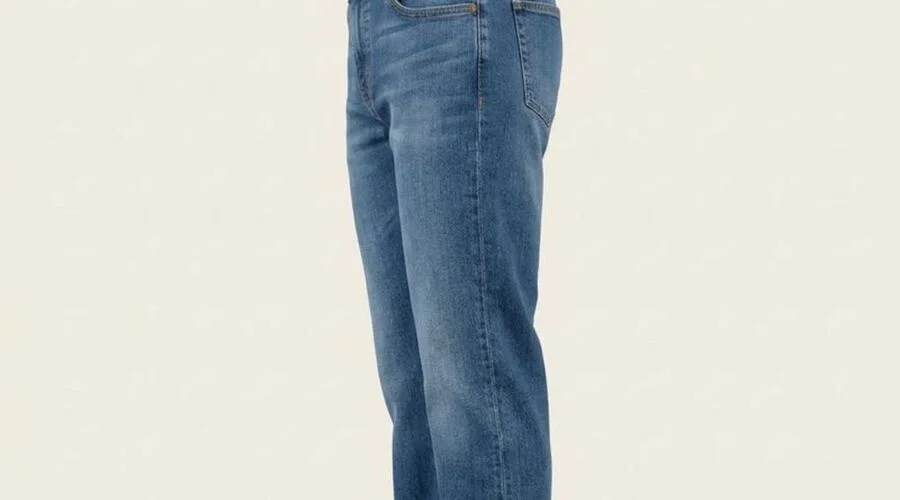 Side view of mid-wash straight jeans showing the outseam running from hip to hem