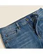 Close-up of the waistband, button and fly on men's athletic taper jeans