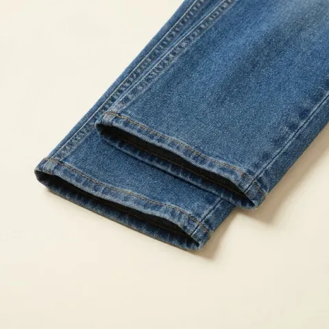 Close-up render of a regular stitched jeans hem with no cuff