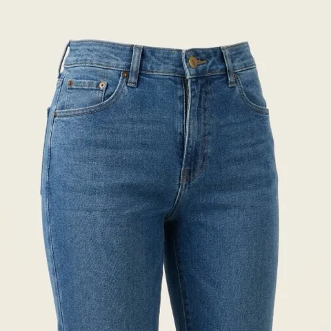 Close-up render of mid-rise jeans with the waistband just below the navel