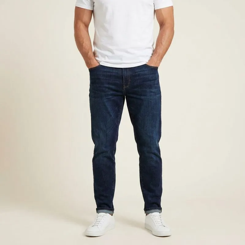 Athletic Taper Jeans worn on a model