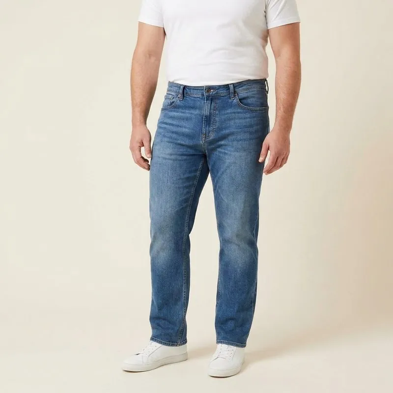 Straight jeans worn by a man with an inverted trapezoid body shape