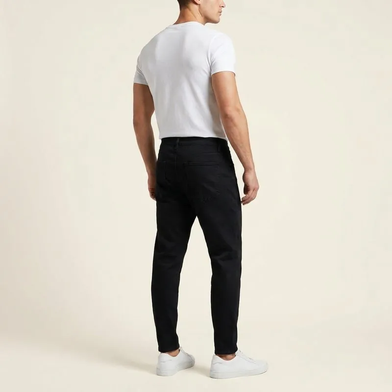 Athletic Taper jeans worn by a man with an inverted triangle body shape, back view