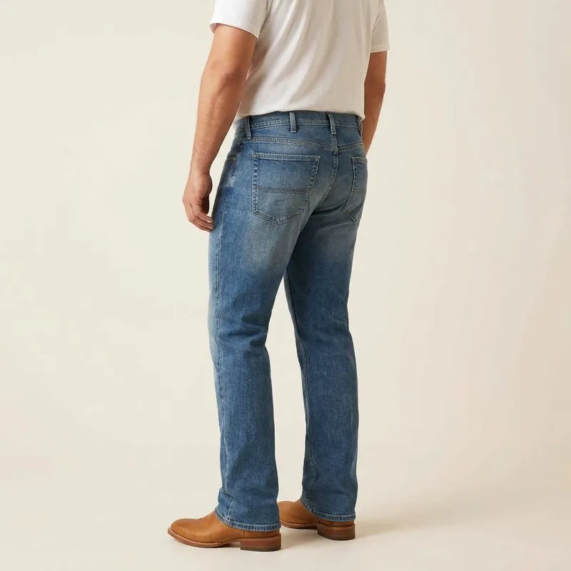Bootcut jeans worn by a man with an oval body shape, back view