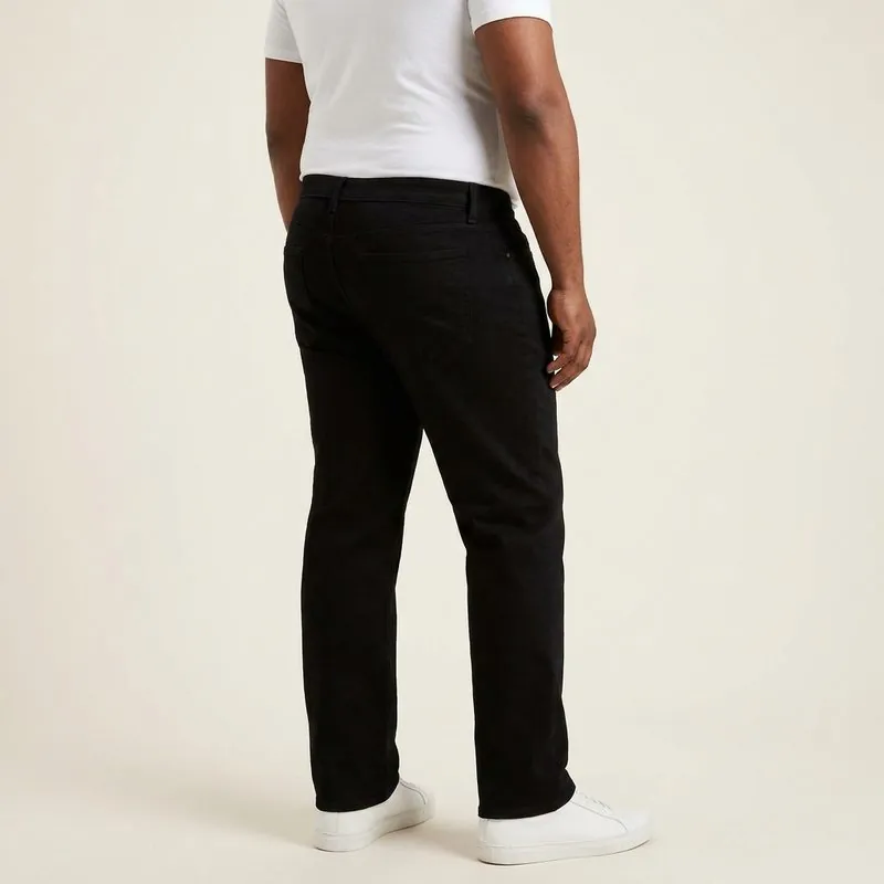 Straight jeans worn by a man with an oval body shape, back view