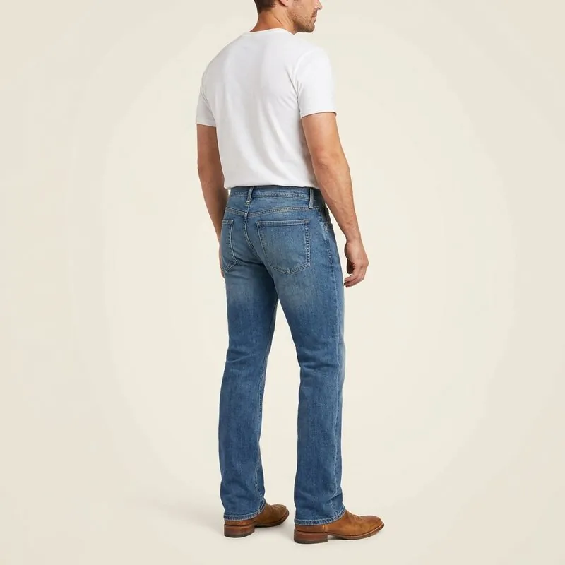 Bootcut jeans worn by a man with a rectangle body shape, back view