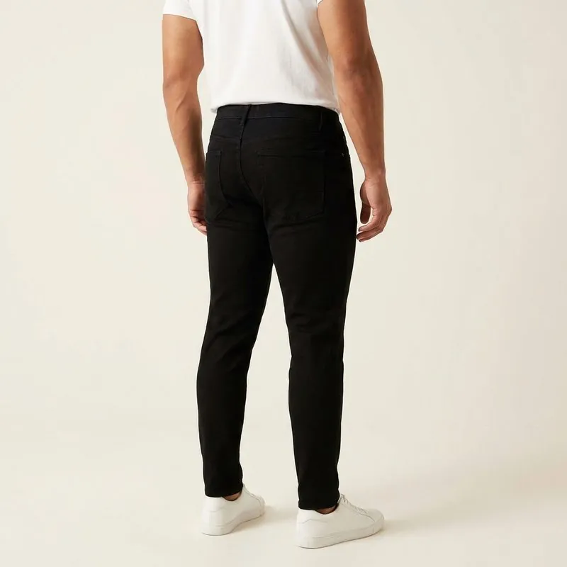 Athletic Taper jeans worn by a man with a rhomboid body shape, back view