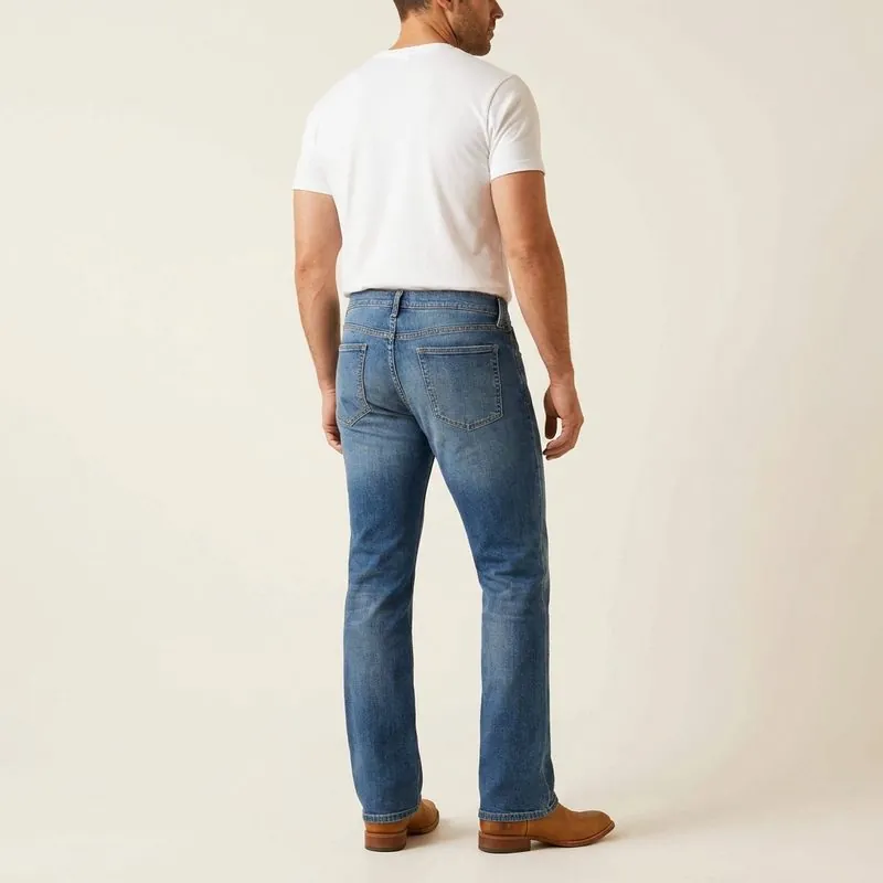 Bootcut jeans worn by a man with a triangle body shape, back view