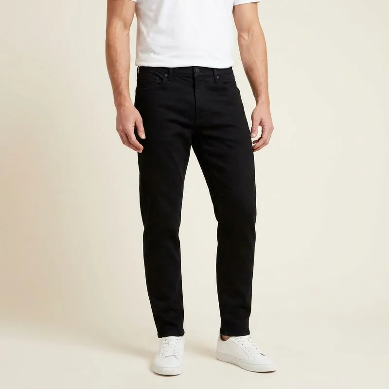 Tall Men's Jeans: Athletic Taper jeans worn on a model