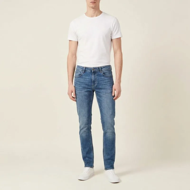 Slim jeans worn by a man with an ectomorph body type