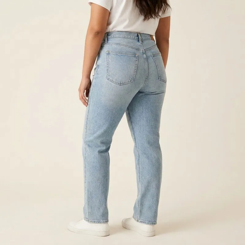 Straight jeans worn by a woman with an endomorph body type, back view