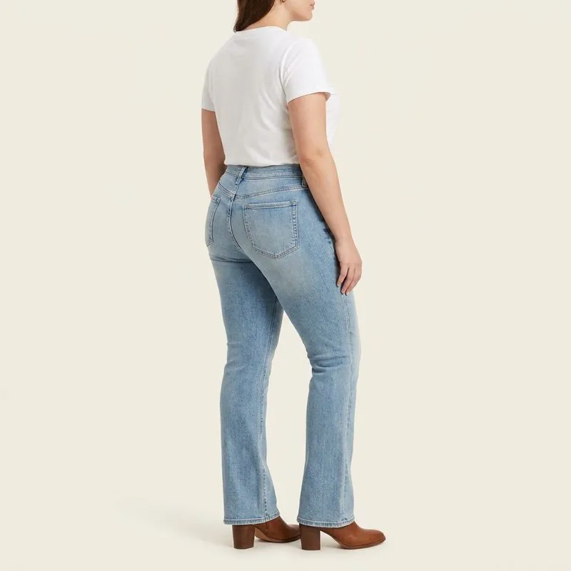 Bootcut jeans worn by a woman with an apple-shaped body, back view