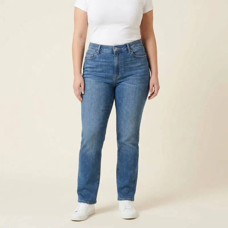 Straight jeans worn by a woman with a barrel body shape