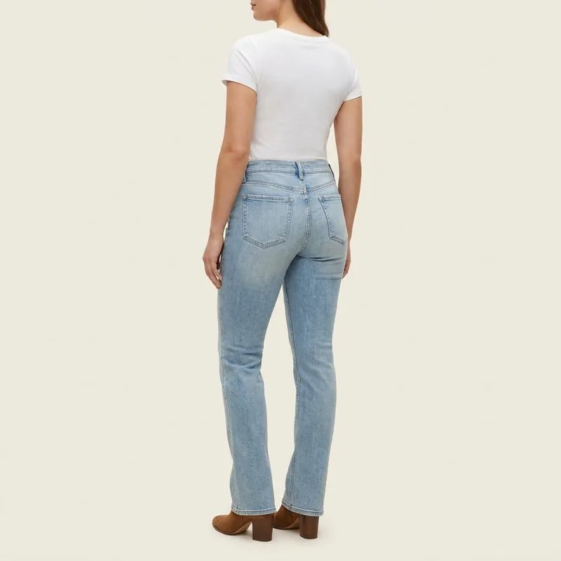 Bootcut jeans worn by a woman with a diamond body shape, back view
