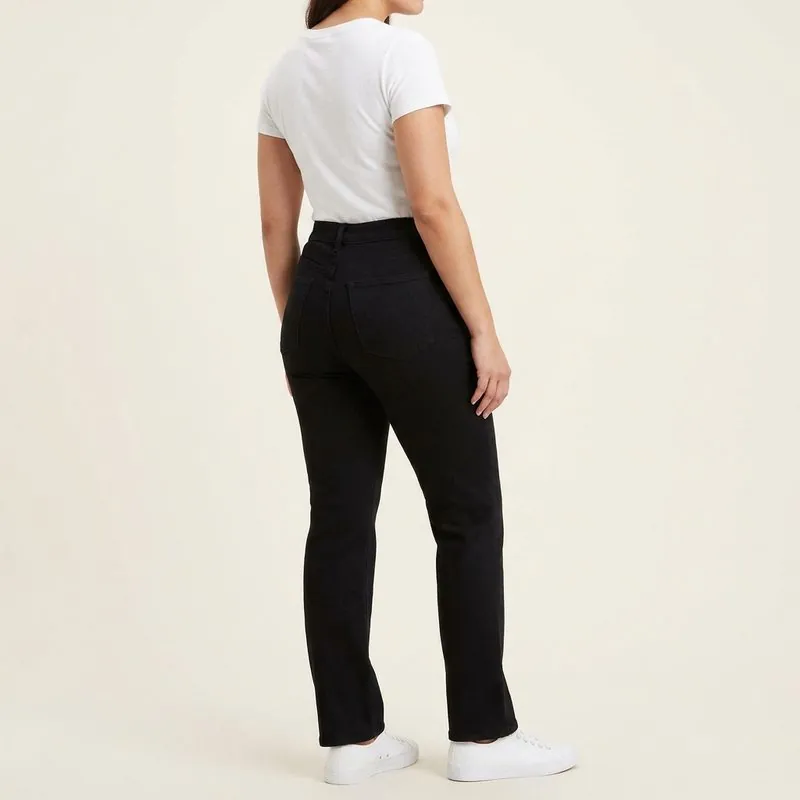 Straight jeans worn by a woman with a diamond body shape, back view