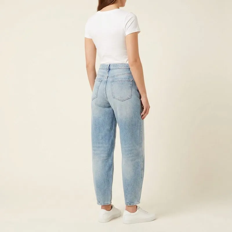 Barrel jeans worn by a woman with a rectangle body shape, back view