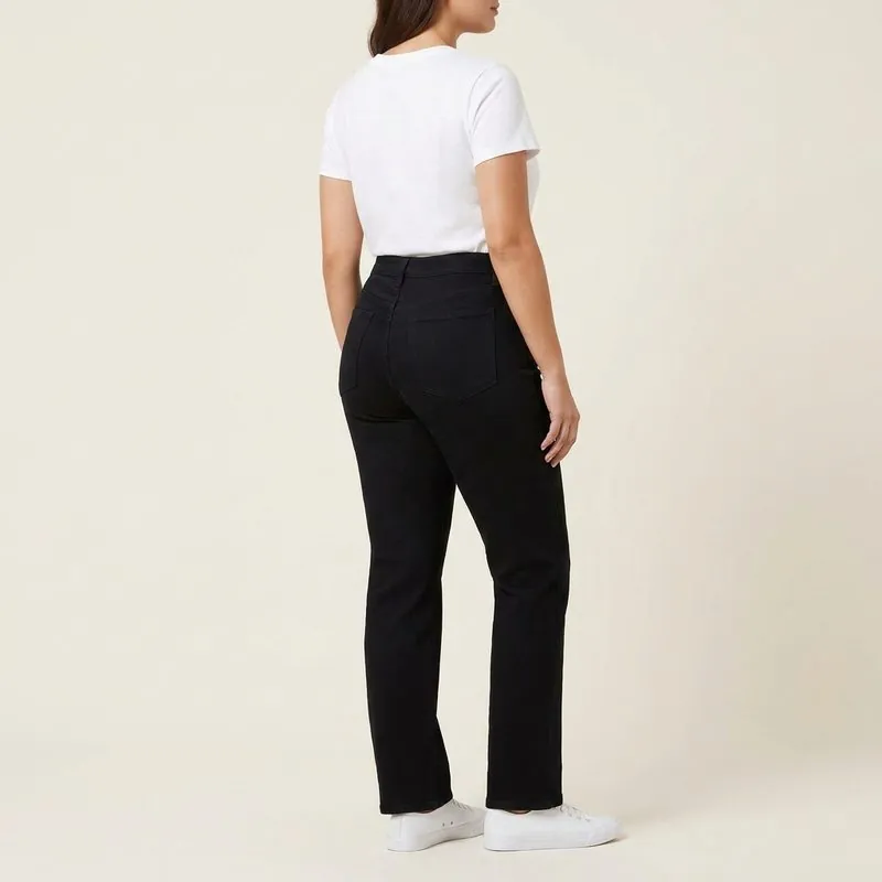 Straight jeans worn by a woman with a top hourglass shape, back view