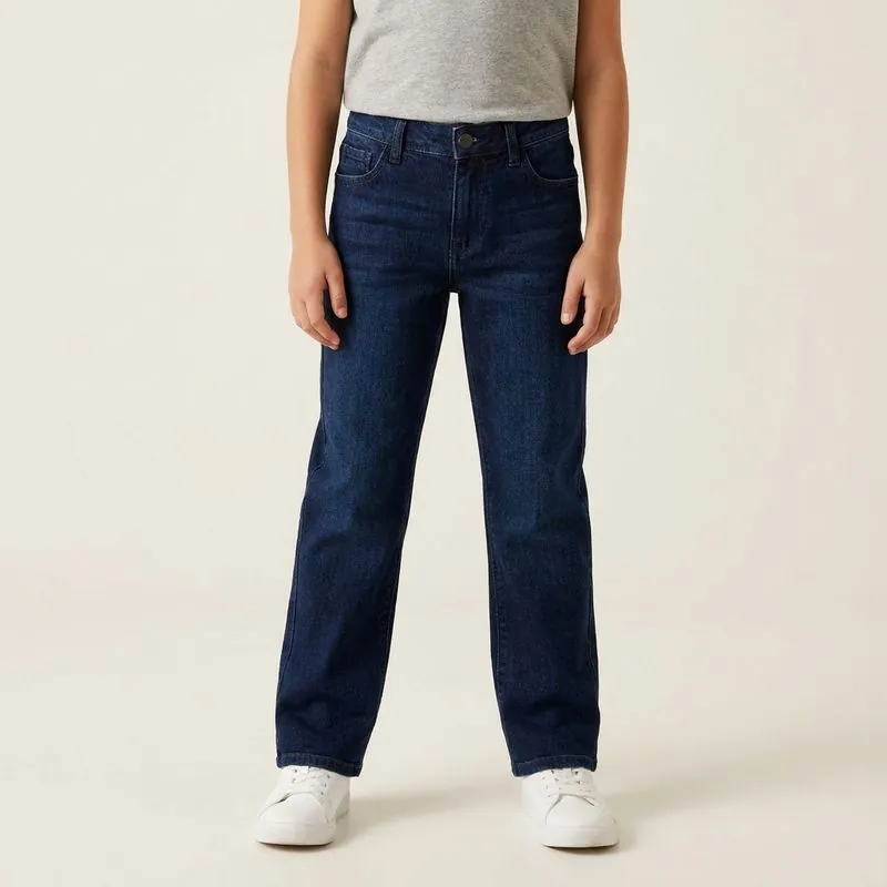Child wearing dark wash jeans
