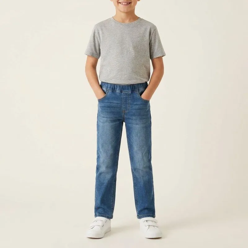Kids' Pull-On Adaptive Jeans jeans in mid wash, worn on a model