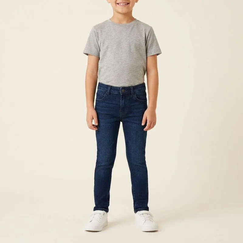 Kids' Slim Custom Jeans jeans in dark wash, worn on a model