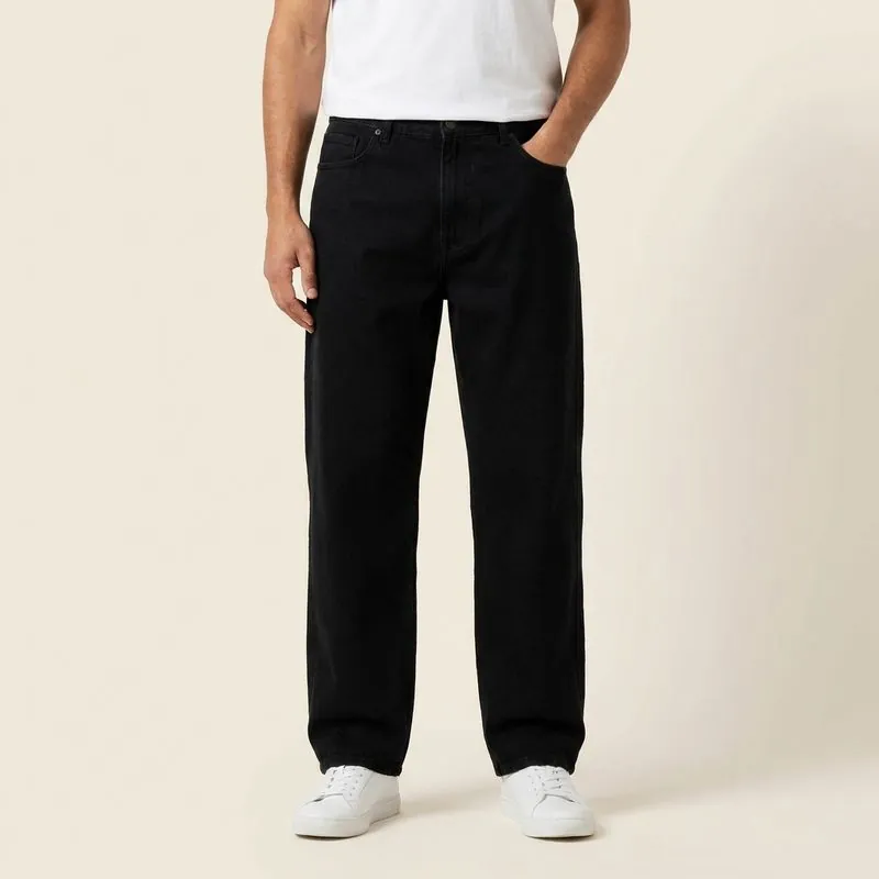 The Relaxed – Men's Custom Jeans in black, worn on a model