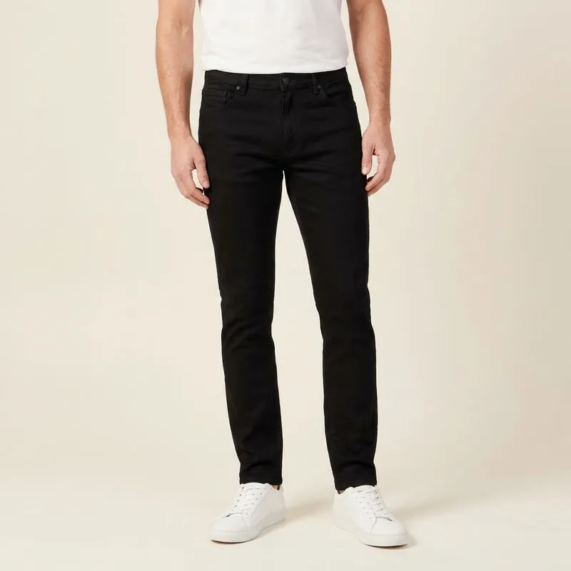 Slim jeans in black wash, worn on a model