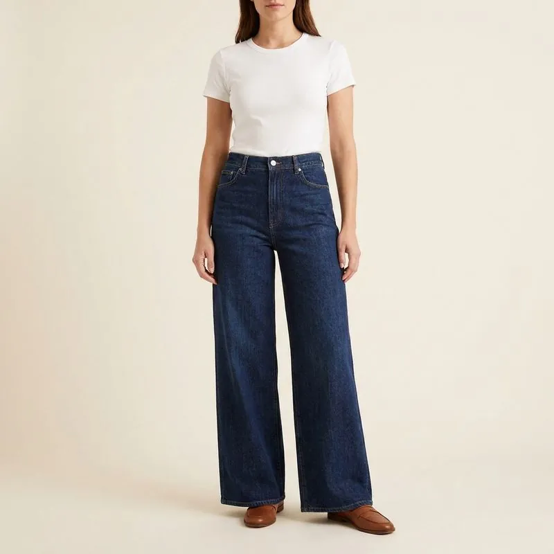 Wide Leg jeans in dark wash, worn on a model