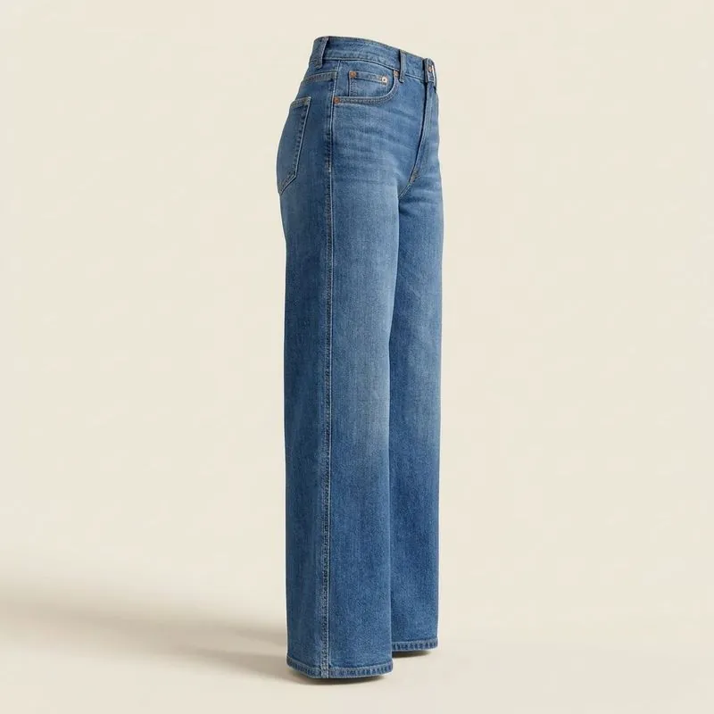 Side view of wide-leg jeans falling straight from hip to hem